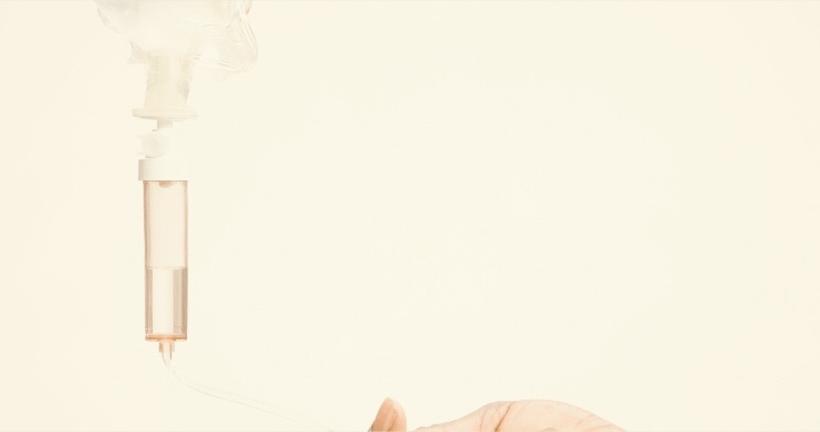 Provider-administered NAD+ IV therapy drip in a relaxing treatment setting at AMMA Aesthetics in South Miami